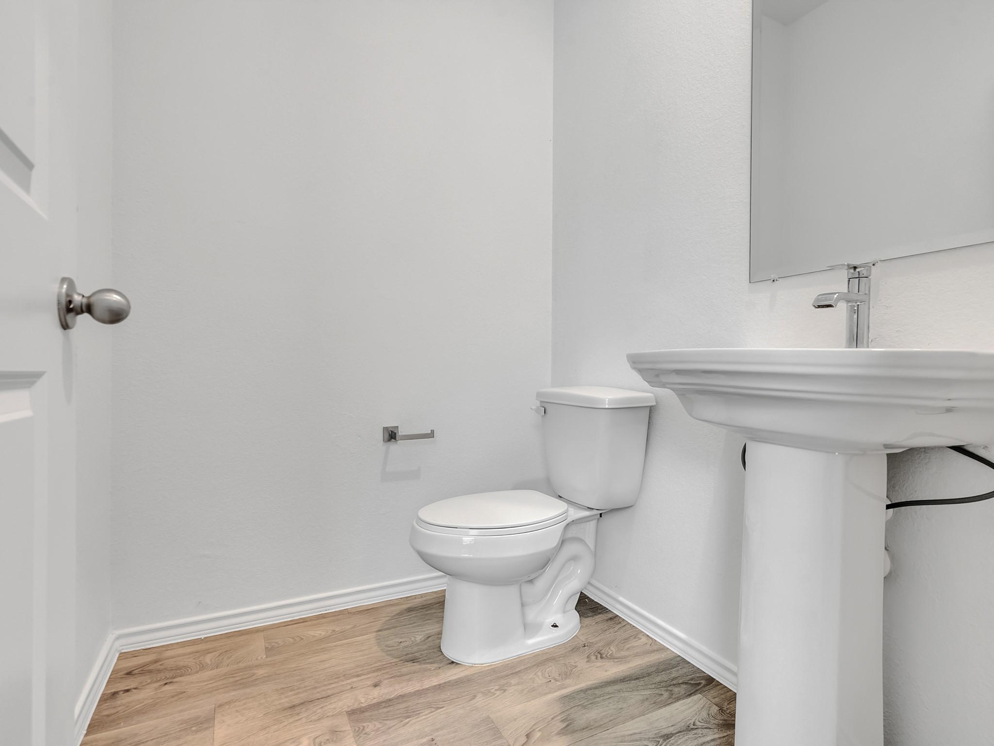 5431 Tuscany Hills Lane Spring, TX 77373 - Photo 14 of 22 a bathroom with a toilet sink and mirror