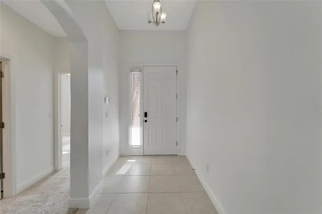 a kitchen with stainless steel appliances granite countertop a sink and a wooden floors
