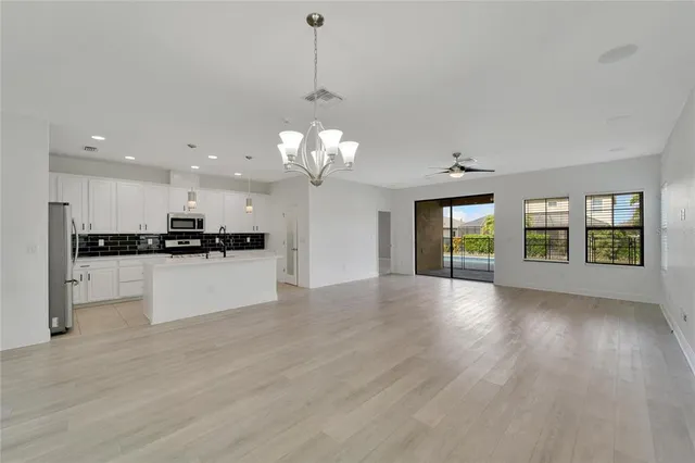 a view of a bathroom from a hallway