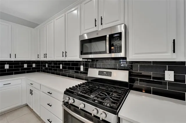 a front view of a house with a yard and porch