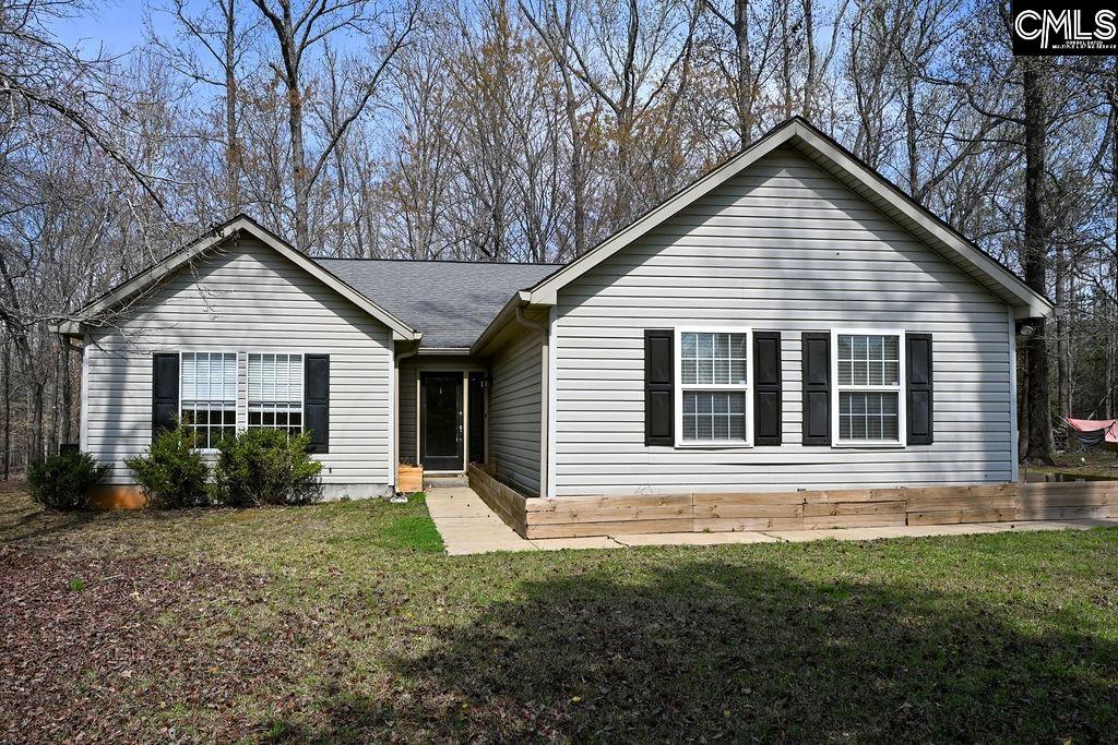 88 Running Deer Road Blythewood, SC 29016 - Photo 1 of 24 a view of a house with yard and plants