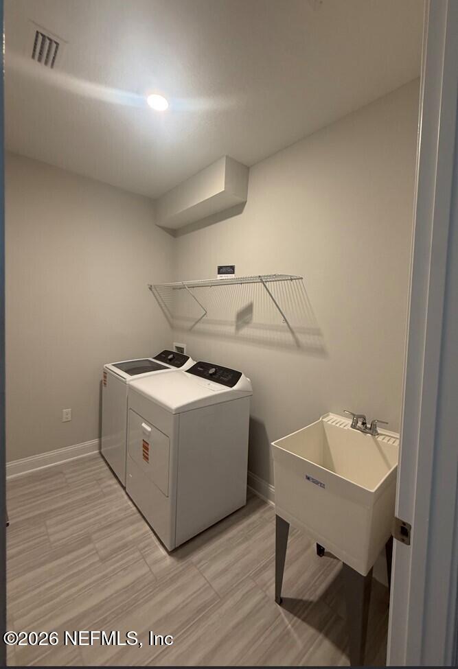 15 Mulberry Road Palm Coast, FL 32164 - Photo 16 of 22 Laundry w W-D & sink