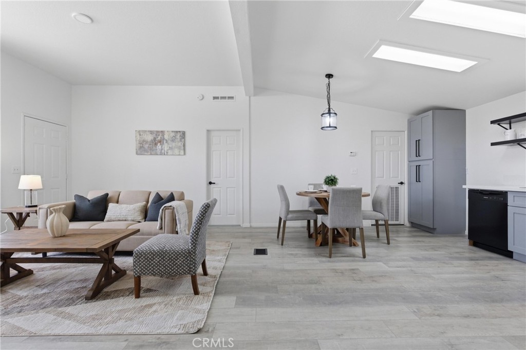 4901 Green River Road, Unit 153 Corona, CA 92878 - Photo 11 of 55 a living room with furniture