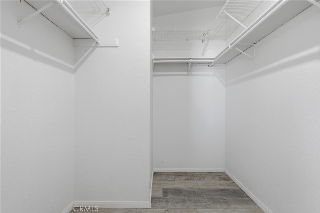 4901 Green River Road, Unit 153 Corona, CA 92878 - Photo 22 of 55 a view of an empty walk in closet