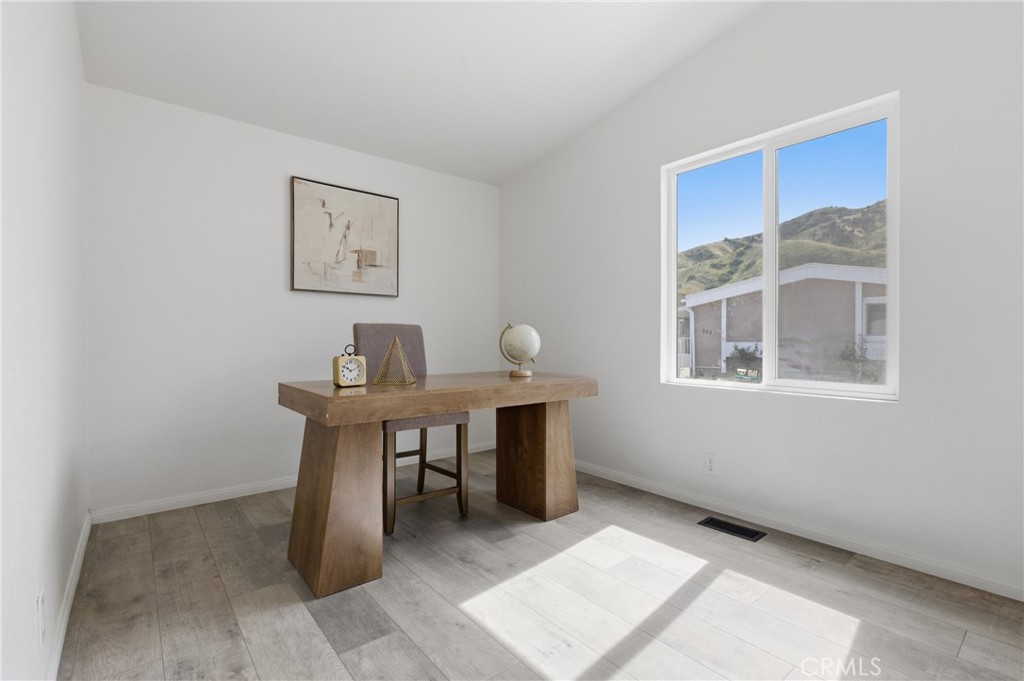 4901 Green River Road, Unit 153 Corona, CA 92878 - Photo 27 of 55 a view of a workspace with furniture