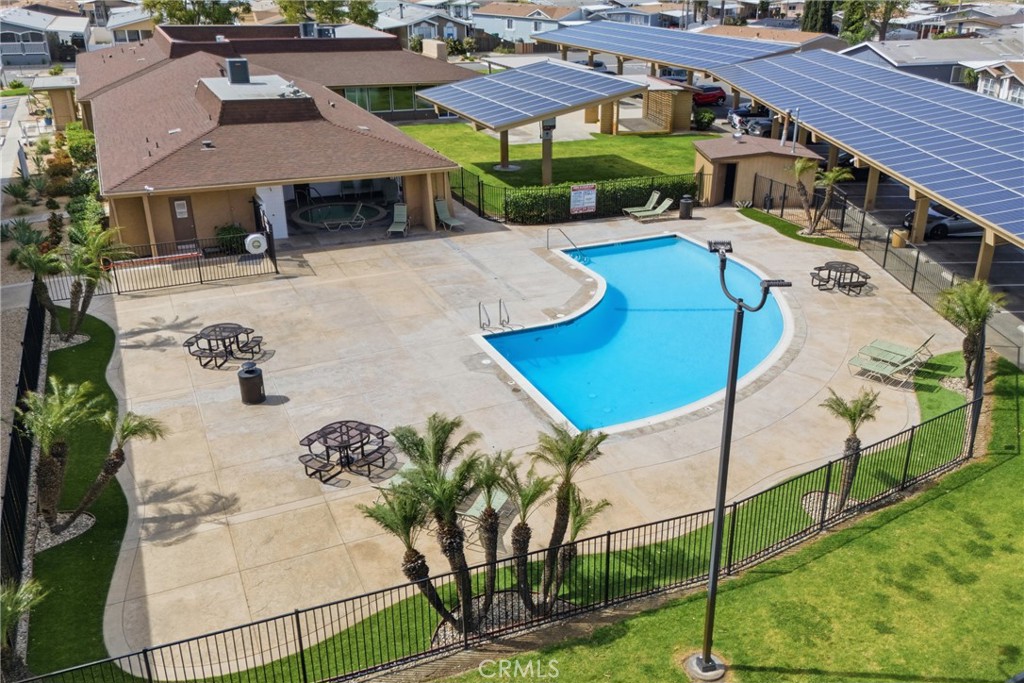 4901 Green River Road, Unit 153 Corona, CA 92878 - Photo 47 of 55 an aerial view of a house with swimming pool