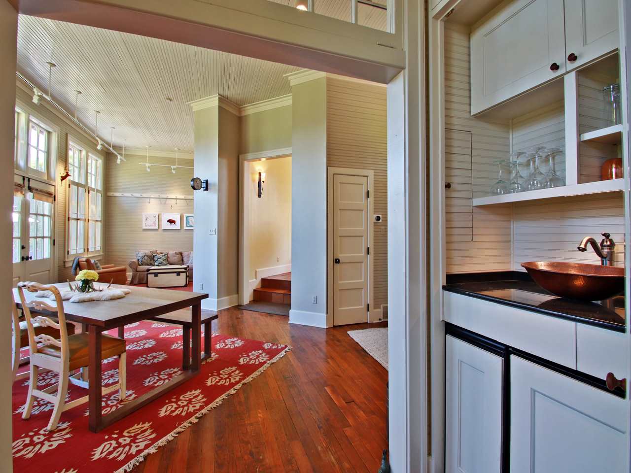 12470 Macon Road Collierville, TN 38017 - Photo 7 of 21 This home will be your retreat from city life! The home has custom built in bar with mini fridge, custom built in storage. and too many architectural details to mention.