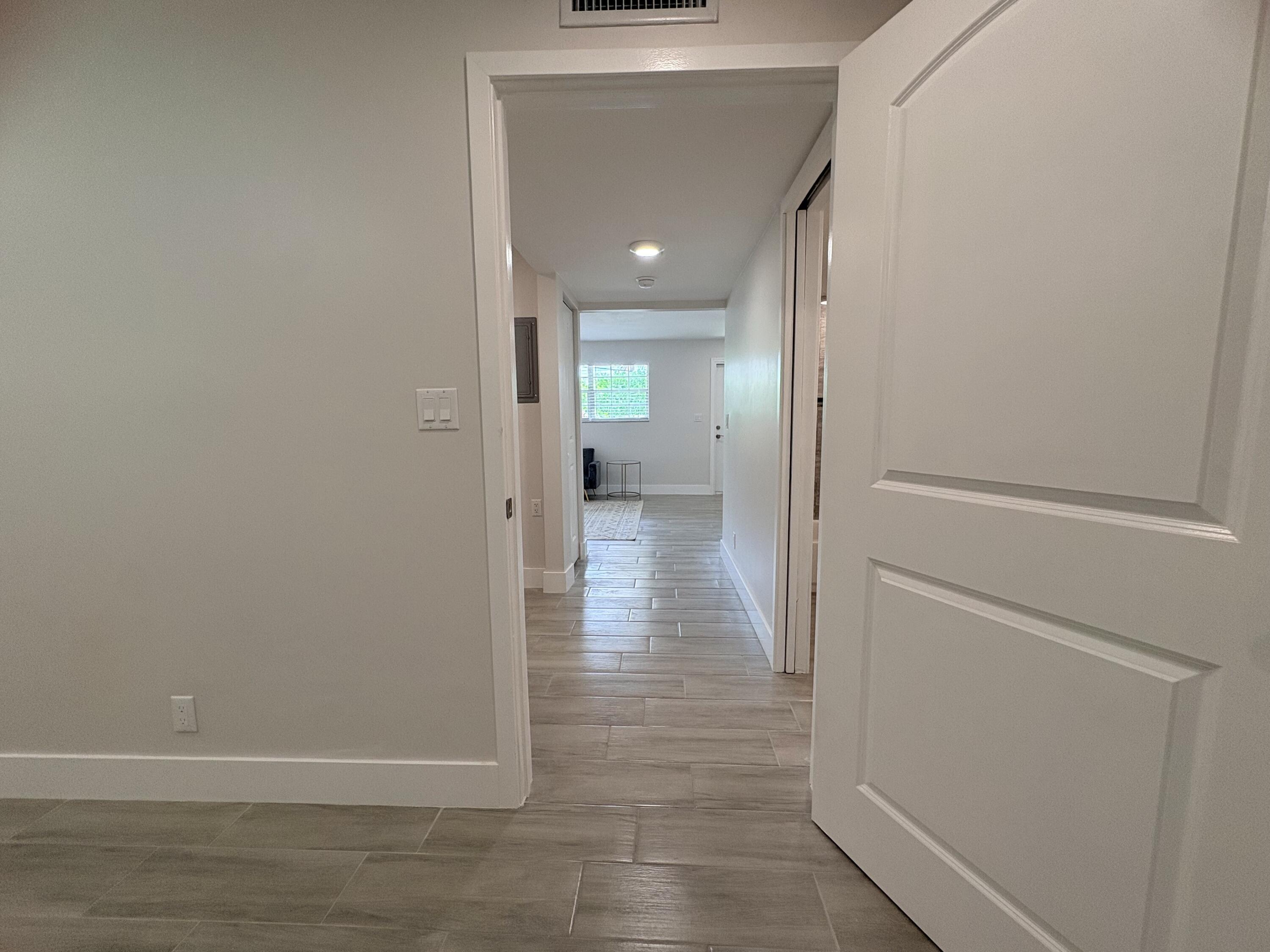 2202 Northeast 36th Street, Unit 17 Lighthouse Point, FL 33064 - Photo 16 of 28 BedroomViewToHallWay