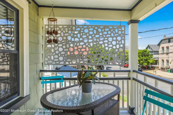 a view of a balcony dining area
