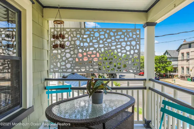 a view of a balcony dining area