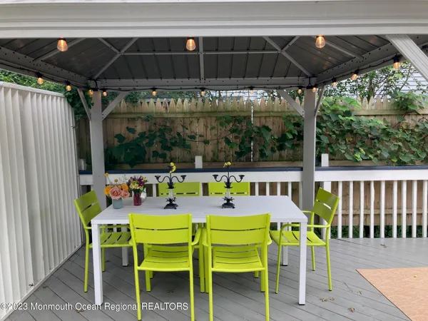 a dining space with furniture and window