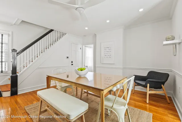 a living room with dining room
