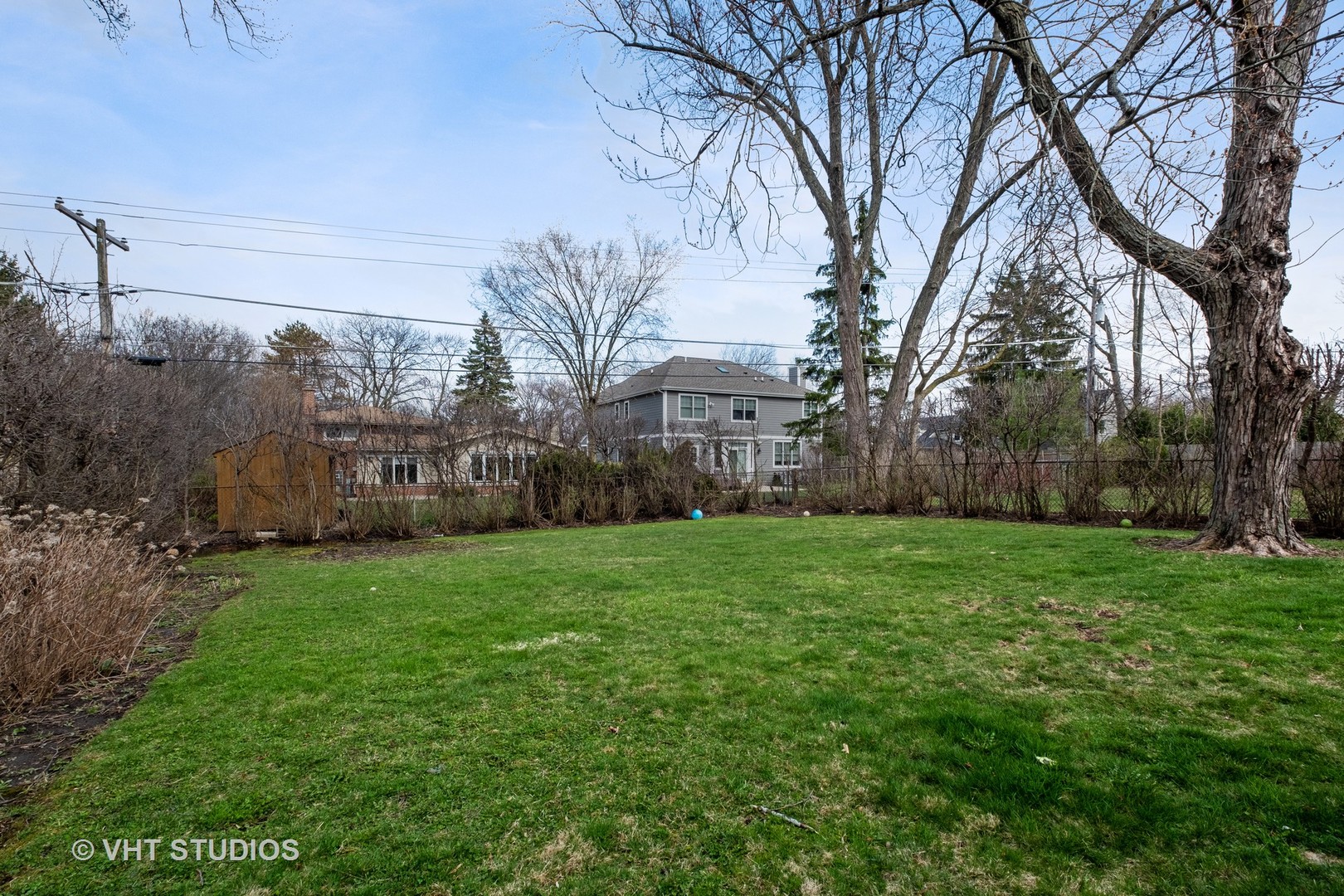 1021 Knollwood Road Deerfield, IL 60015 - Photo 16 of 20 a view of a house with backyard and garden