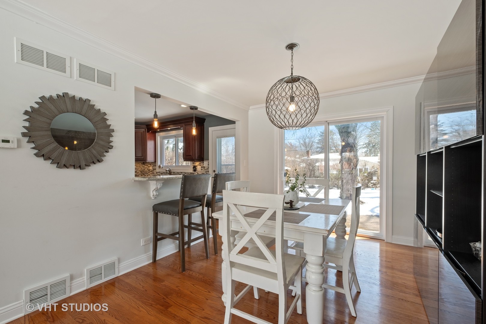 1021 Knollwood Road Deerfield, IL 60015 - Photo 7 of 20 a view of a dining room with furniture window and wooden floor
