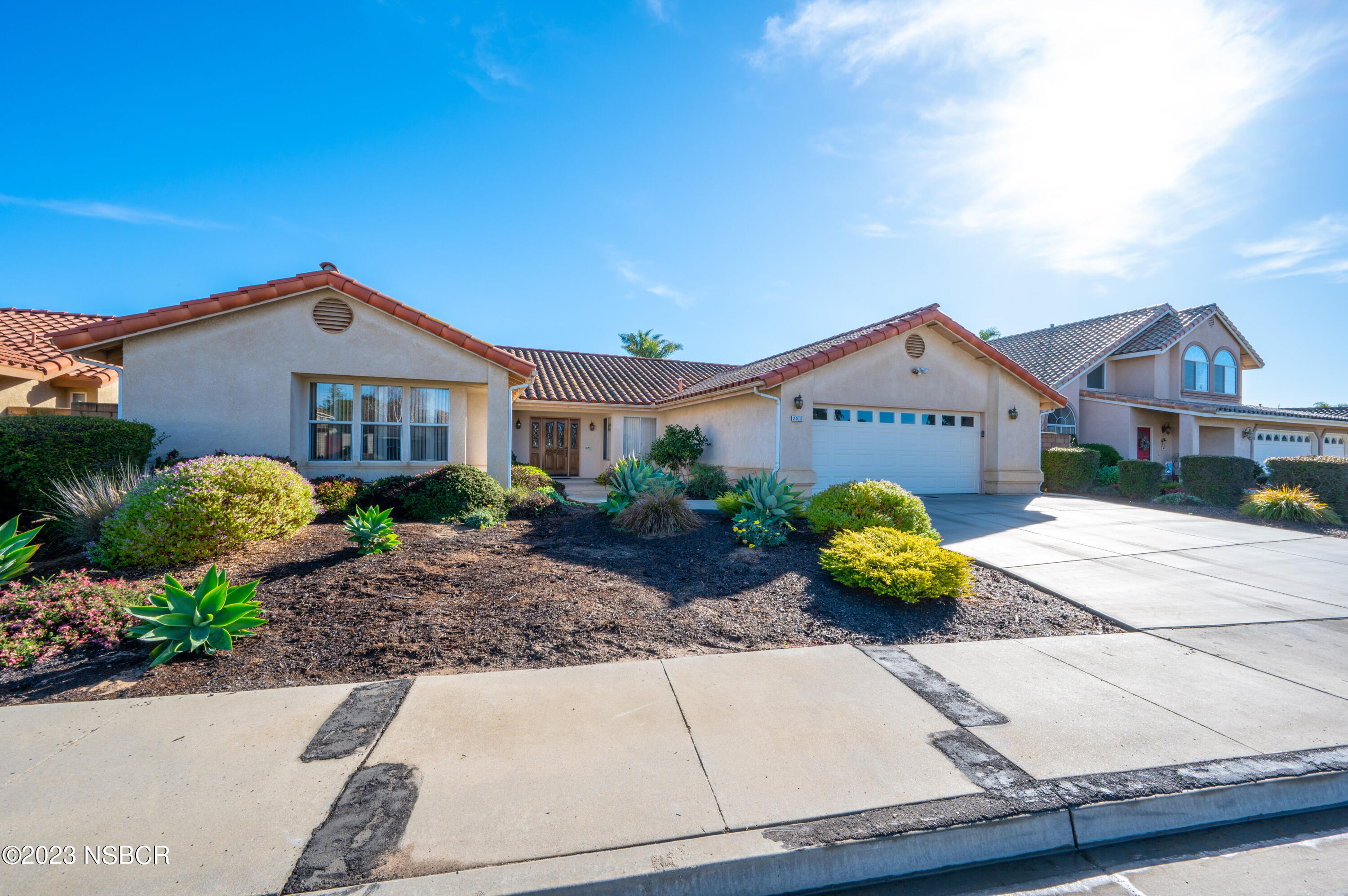 2518 Bardmoor Court Santa Maria, CA 93455 - Photo 1 of 25 a front view of a house with garden