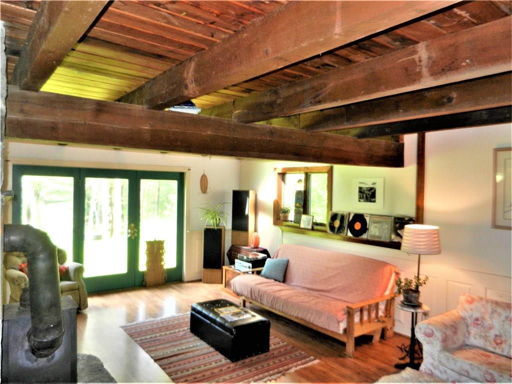 82 Station Road Newcastle, ME 04553 - Photo 13 of 35 Living room with doors that walk out...