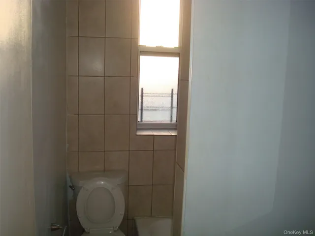 a bathroom with a toilet