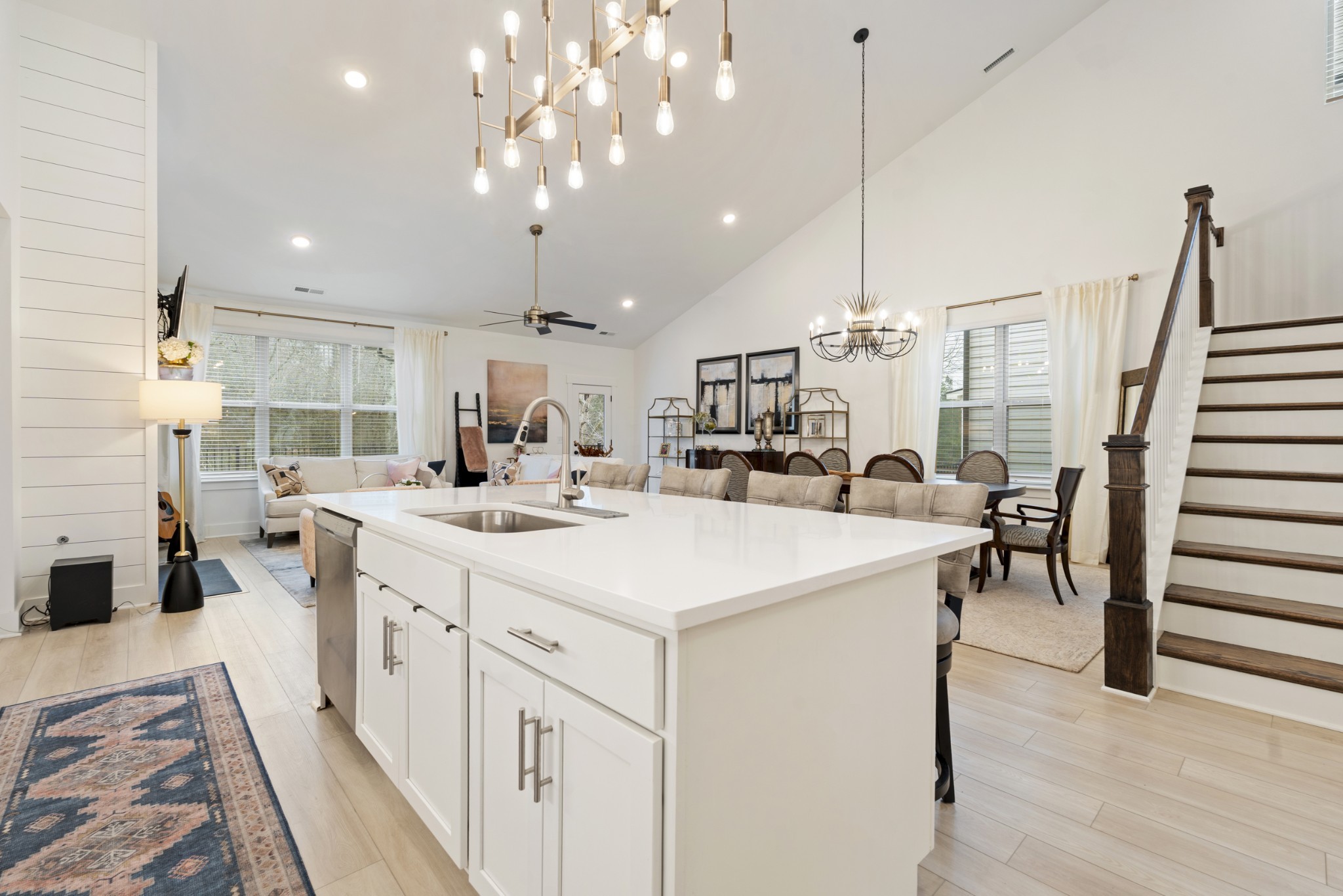 160 Cavalcade Loop Gallatin, TN 37066 - Photo 13 of 38 a kitchen with kitchen island a sink appliances and a dining table