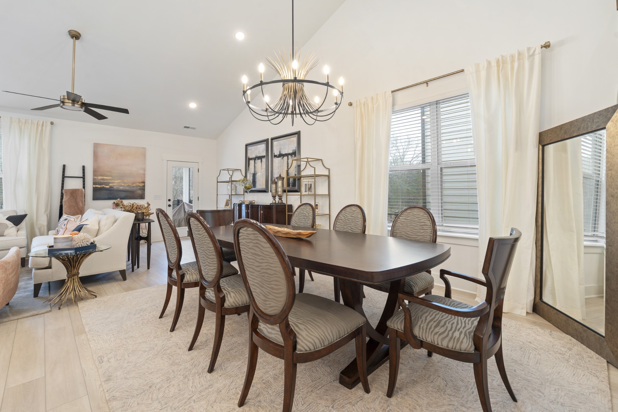 160 Cavalcade Loop Gallatin, TN 37066 - Photo 16 of 38 a view of a dining room with furniture and a chandelier