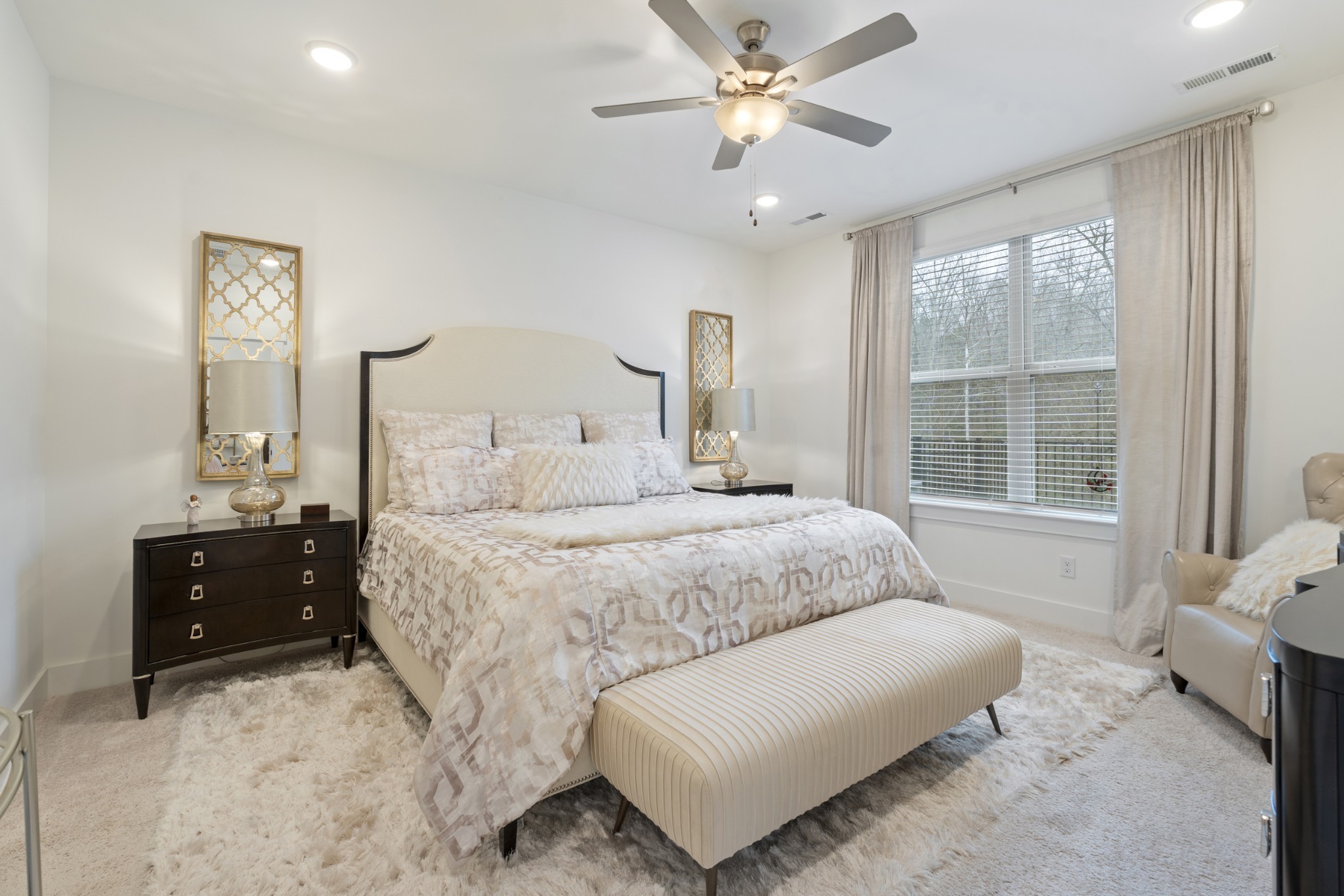 160 Cavalcade Loop Gallatin, TN 37066 - Photo 21 of 38 a bedroom with a large bed and a window