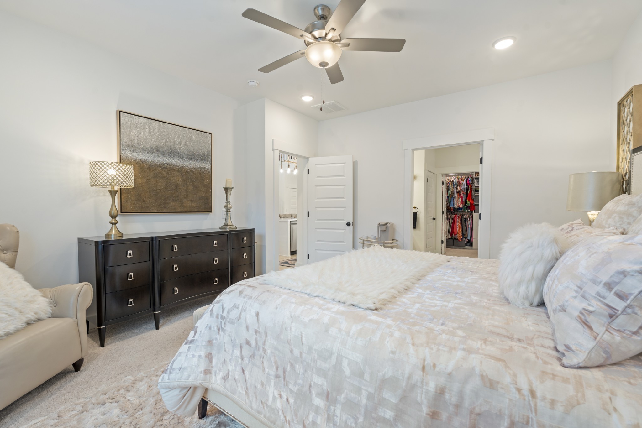 160 Cavalcade Loop Gallatin, TN 37066 - Photo 23 of 38 a bedroom with a bed and a flat screen tv