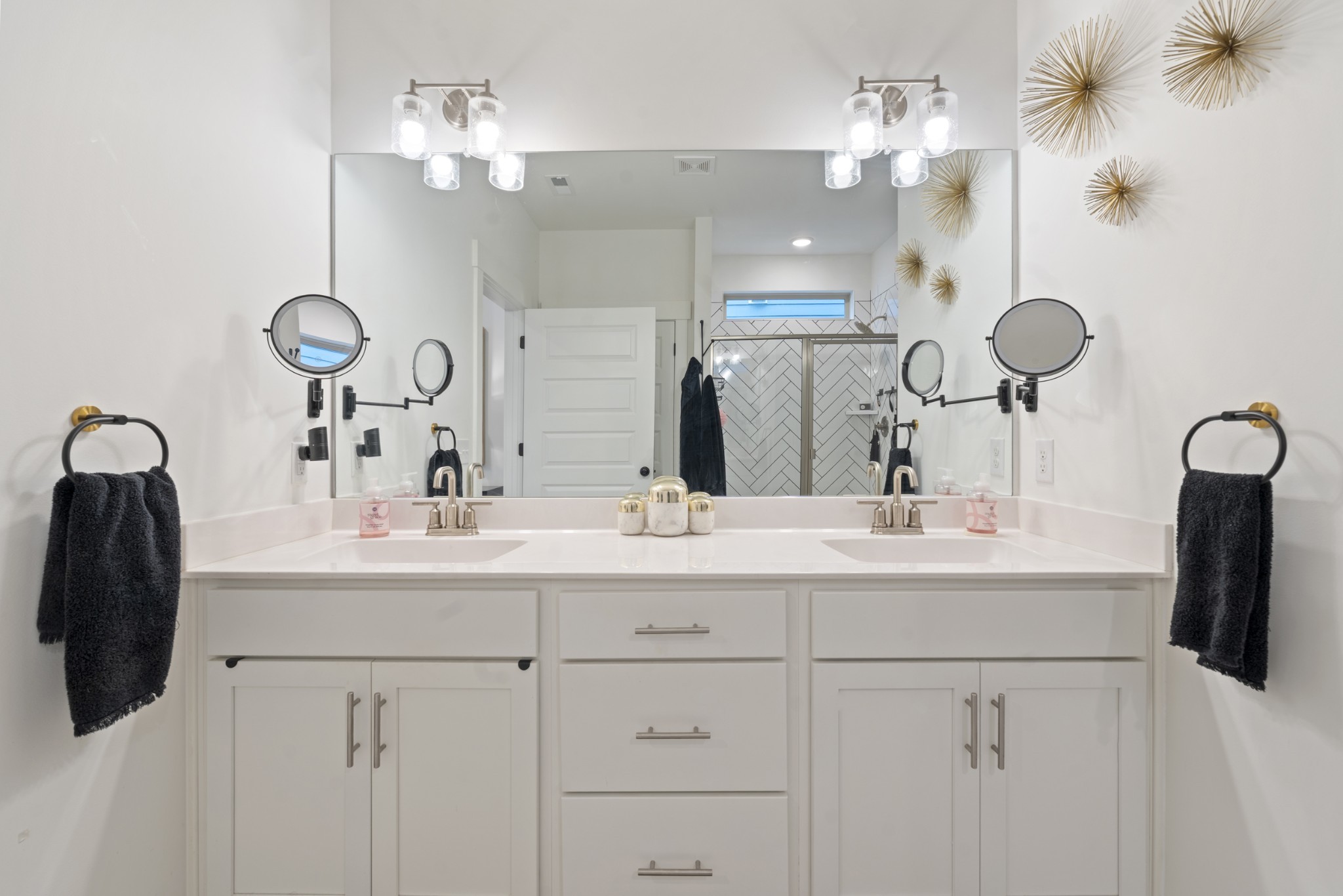 160 Cavalcade Loop Gallatin, TN 37066 - Photo 25 of 38 a bathroom with a double vanity sink and a mirror
