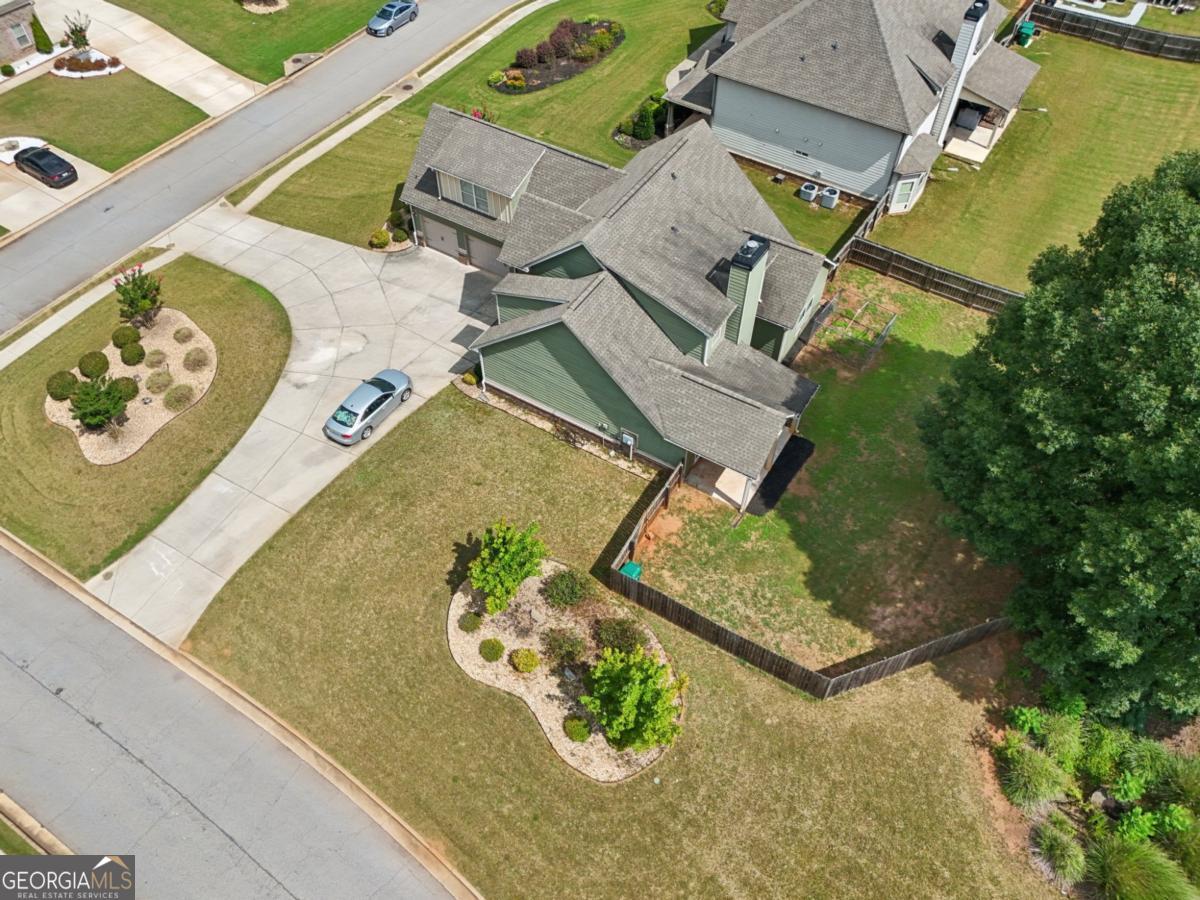 4007 Madison Acres Drive Locust Grove, GA 30248 - Photo 19 of 21 an aerial view of a house with a swimming pool