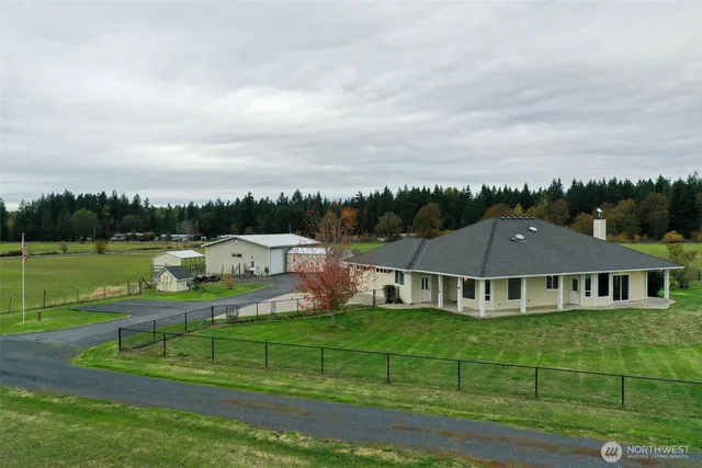 an aerial view of a house with a garden