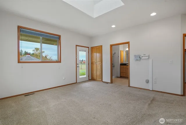 a bathroom with a double vanity sink mirror and double