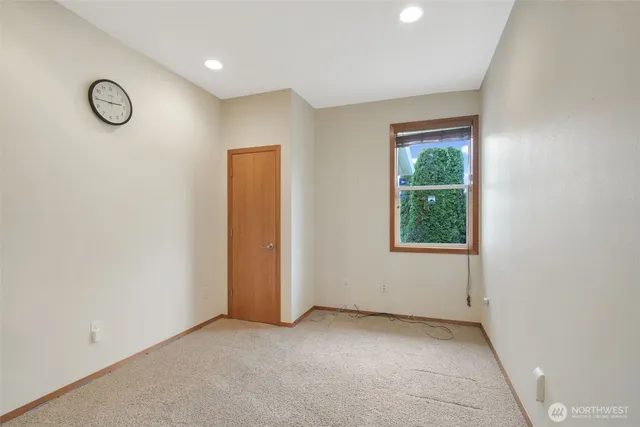 en empty room with windows