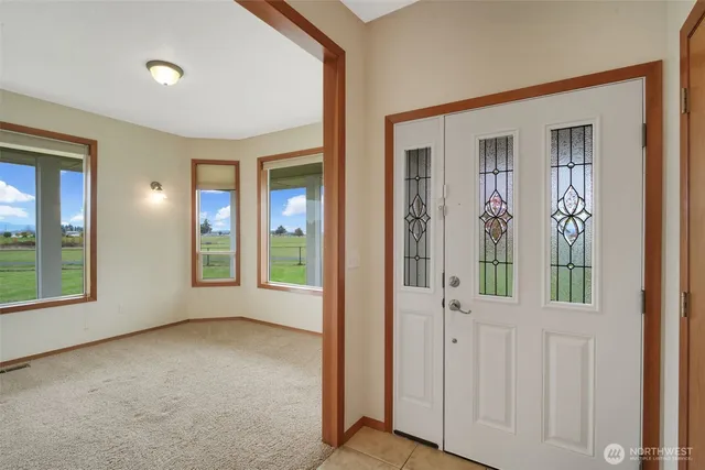 an empty room with windows