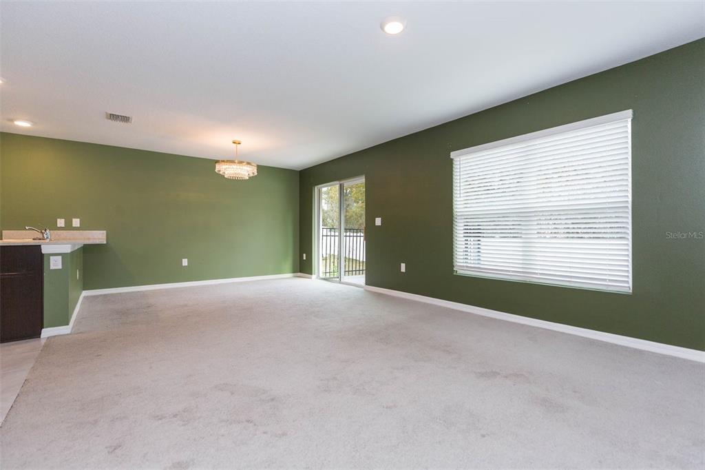 5358 Woodridge Lane Spring Hill, FL 34609 - Photo 13 of 32 a view of an empty room with a window
