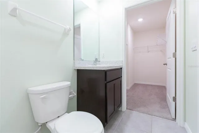 a bathroom with a sink a toilet and a bathtub