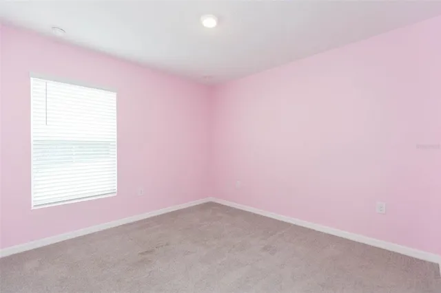 an empty room with an entryway