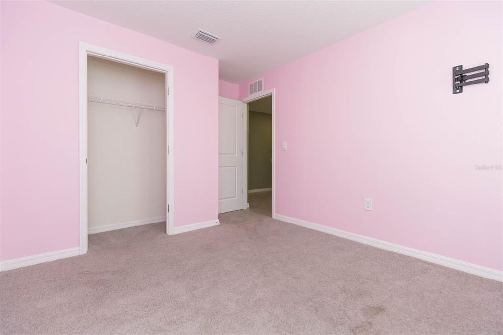 5358 Woodridge Lane Spring Hill, FL 34609 - Photo 21 of 32 an empty room with an entryway