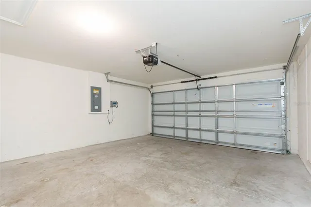 a view of a house with backyard and garden