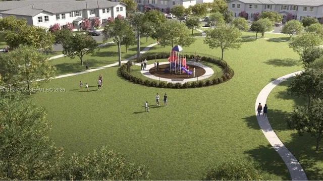 a swimming pool with trees in the background