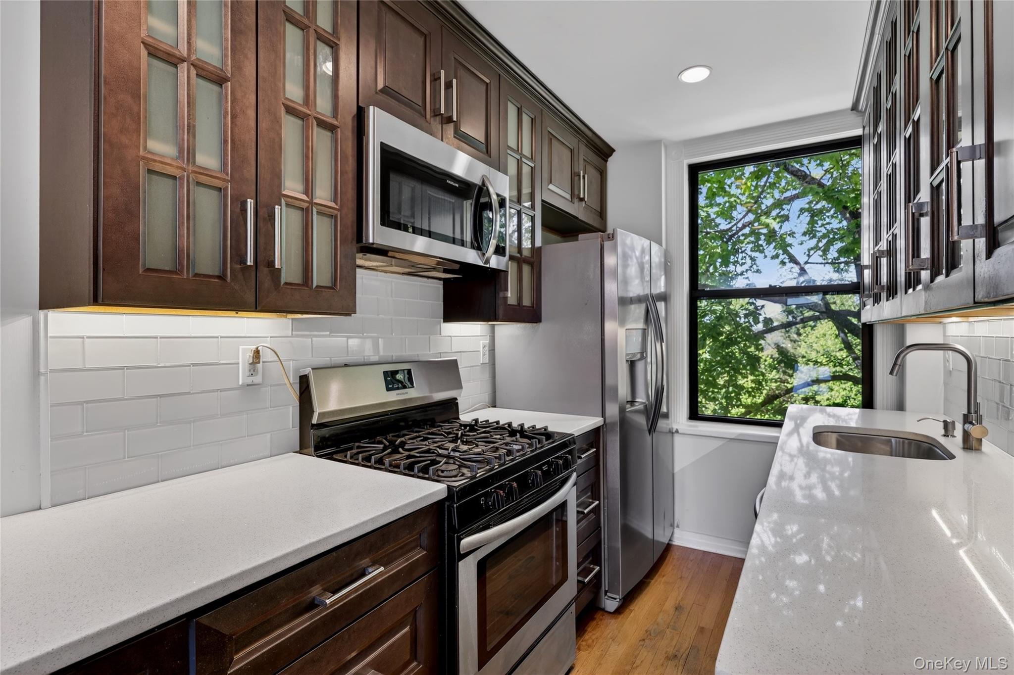64 Sagamore Road, Unit D7 Bronxville, NY 10708 - Photo 5 of 20 Beautiful Kitchen lots of cabinets, Quartz Counters, Stainless Appliances