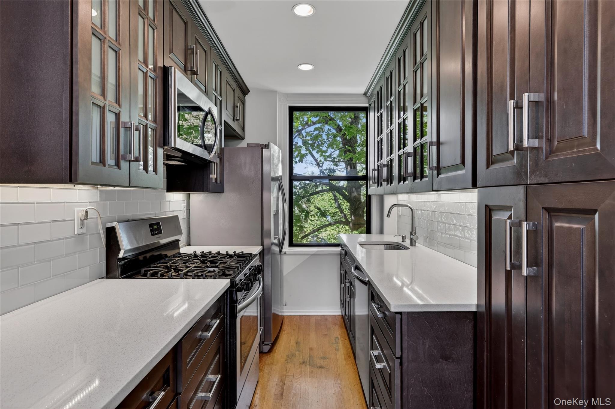 64 Sagamore Road, Unit D7 Bronxville, NY 10708 - Photo 7 of 20 Beautiful Kitchen lots of cabinets, Quartz Counters, Stainless Appliances