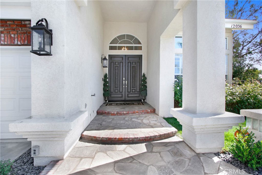 12036 Wood Ranch Road Granada Hills, CA 91344 - Photo 5 of 55 Extra Tall Double Door Entry with security cameras