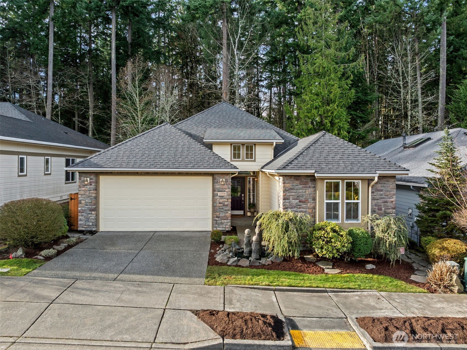 12735 Sun Break Way Northeast Redmond, WA 98053 - Photo 1 of 37 front view of a house with a yard