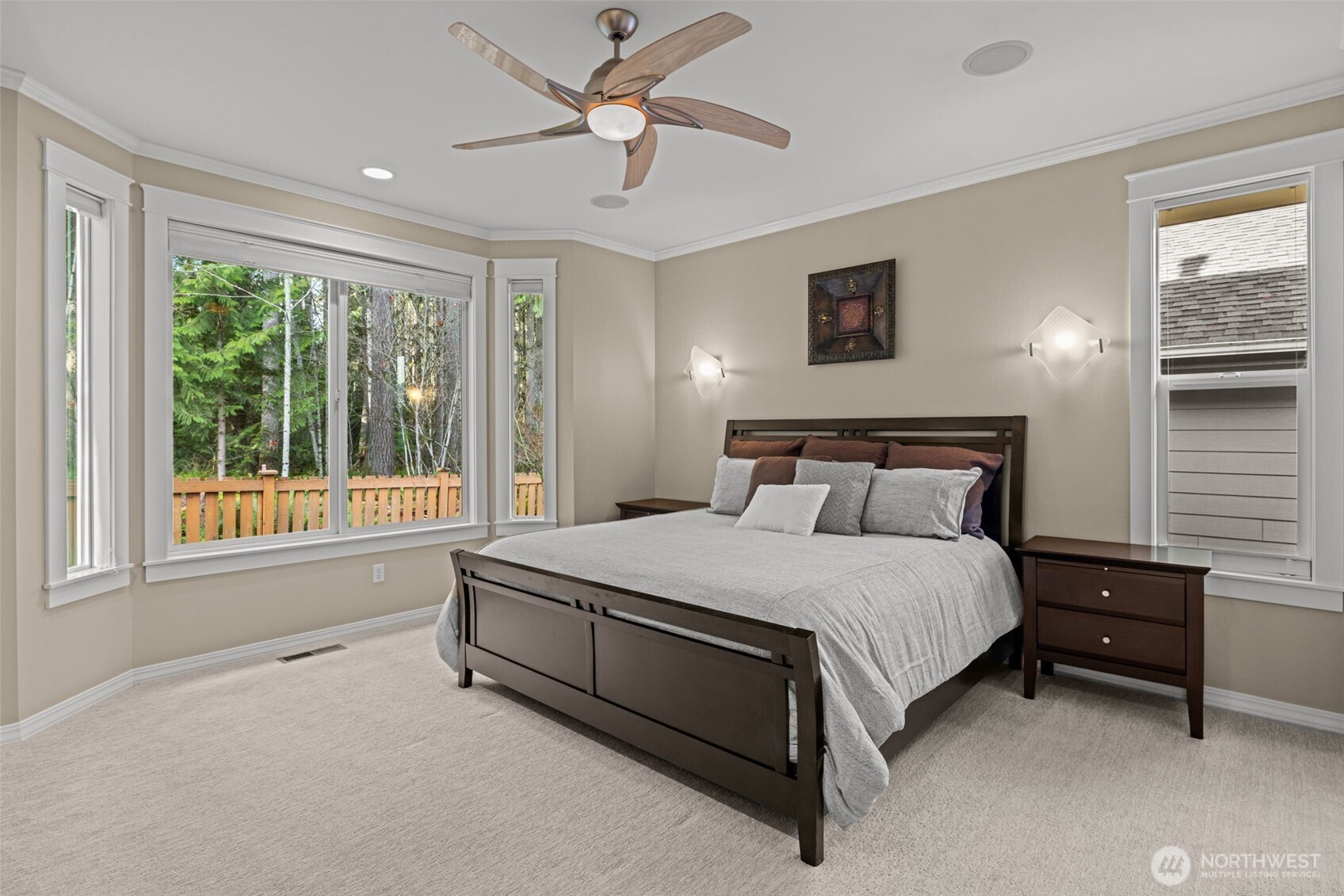 12735 Sun Break Way Northeast Redmond, WA 98053 - Photo 14 of 37 a spacious bedroom with a bed and a large window