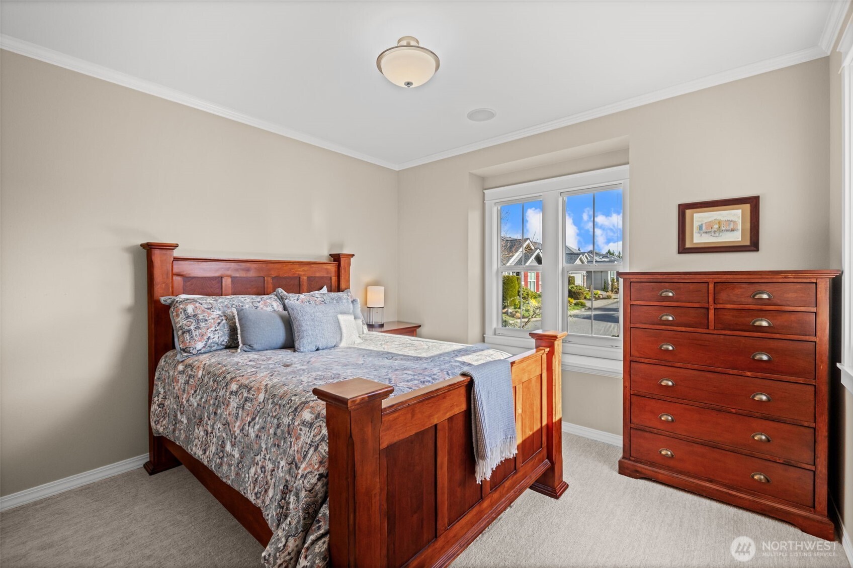 12735 Sun Break Way Northeast Redmond, WA 98053 - Photo 18 of 37 a bedroom with a bed and a dresser in it