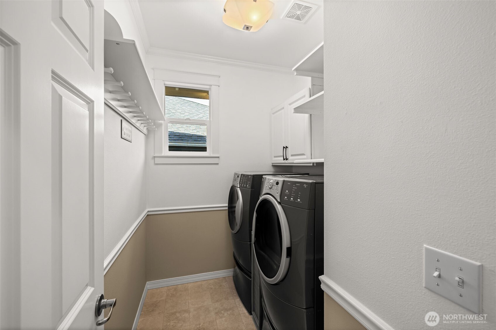 12735 Sun Break Way Northeast Redmond, WA 98053 - Photo 22 of 37 a utility room with dryer and washer