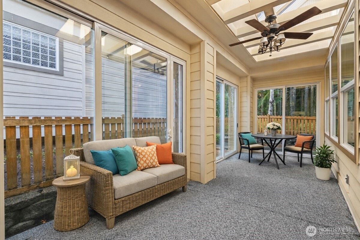 12735 Sun Break Way Northeast Redmond, WA 98053 - Photo 23 of 37 a living room with furniture and a potted plant