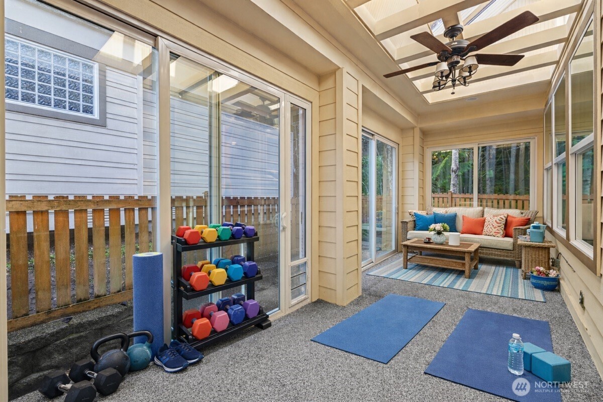 12735 Sun Break Way Northeast Redmond, WA 98053 - Photo 24 of 37 a view of living room with patio furniture and garden