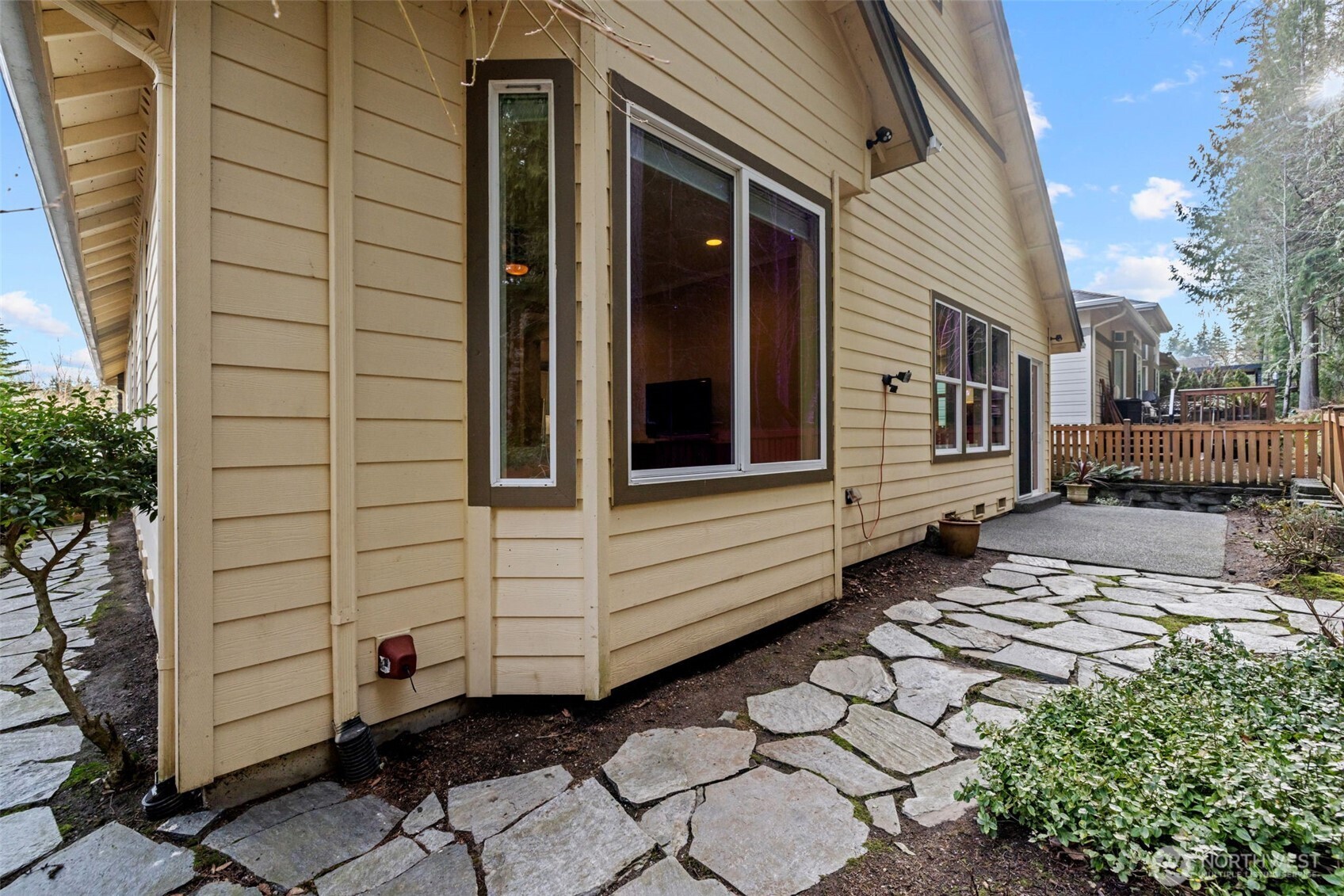 12735 Sun Break Way Northeast Redmond, WA 98053 - Photo 30 of 37 a view of a house with a backyard