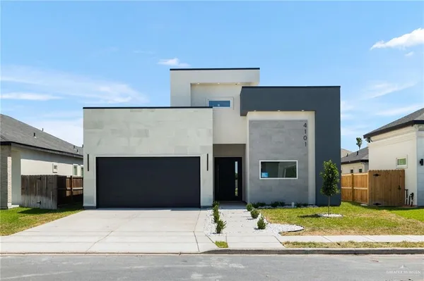 a front view of a house with yard