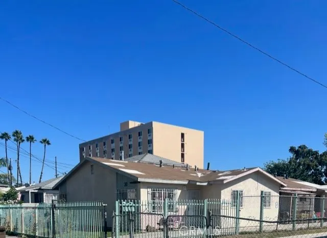 a view of a house with a iron stairs