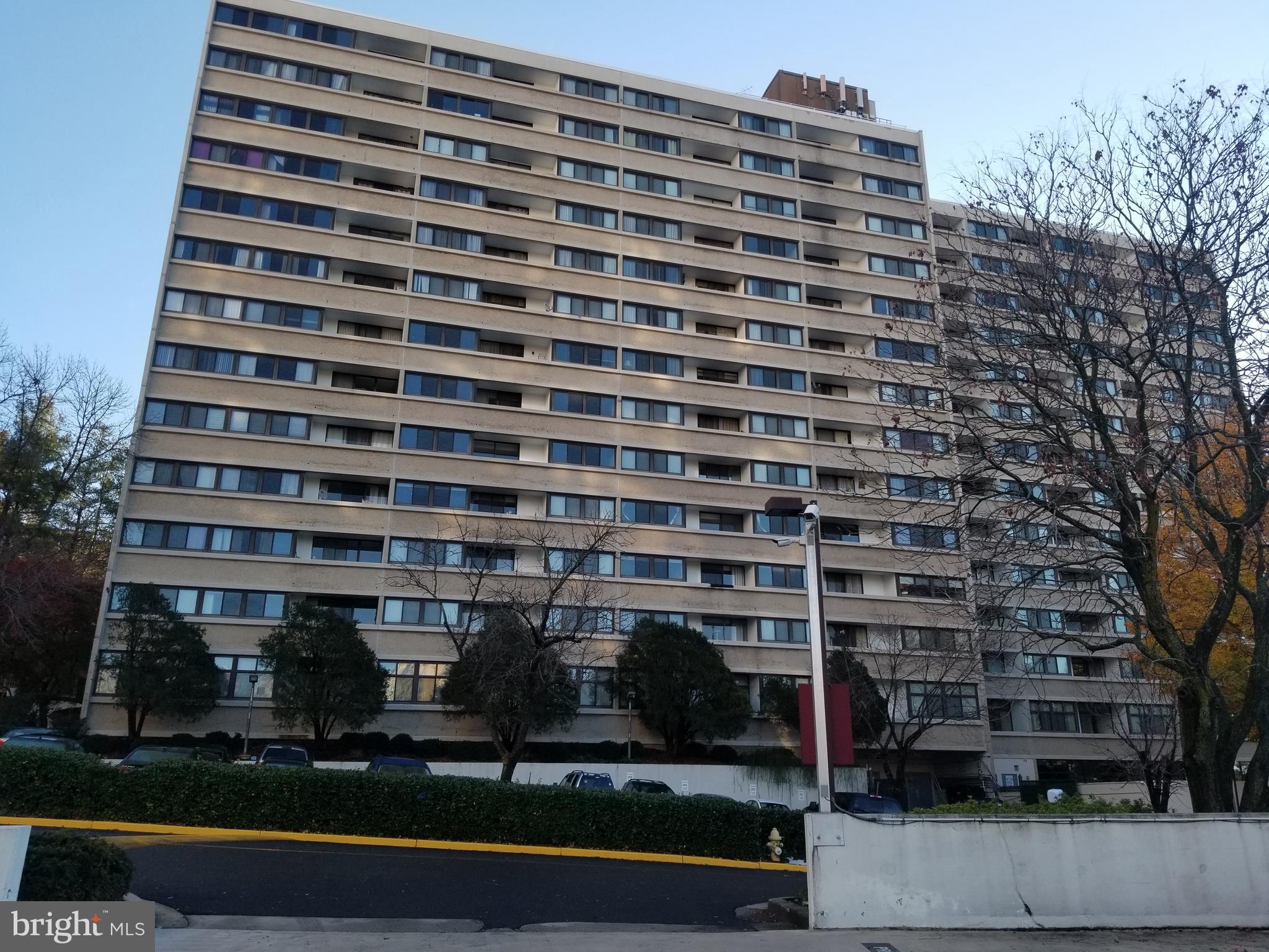 5911 Edsall Road, Unit PH09 Alexandria, VA 22304 - Photo 1 of 14 front view of a building with a street